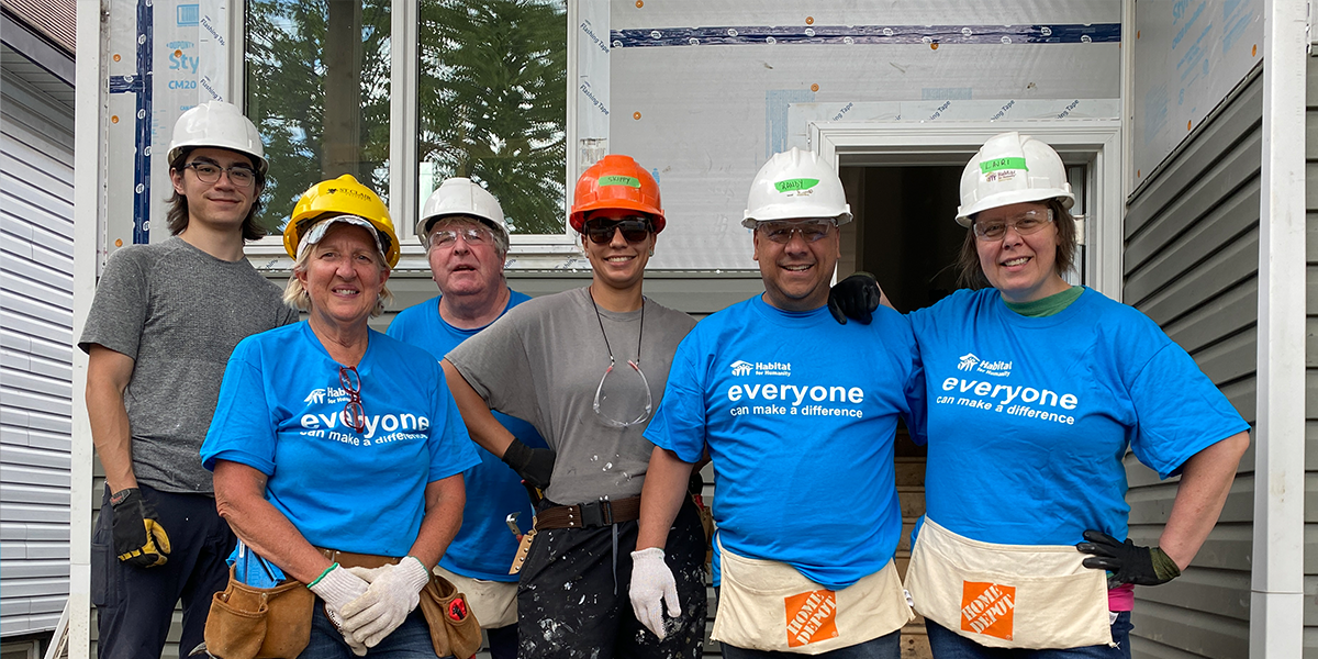 Noah with fellow Habitat volunteers