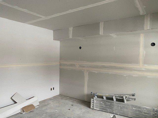 Drywall almost complete in all units!
