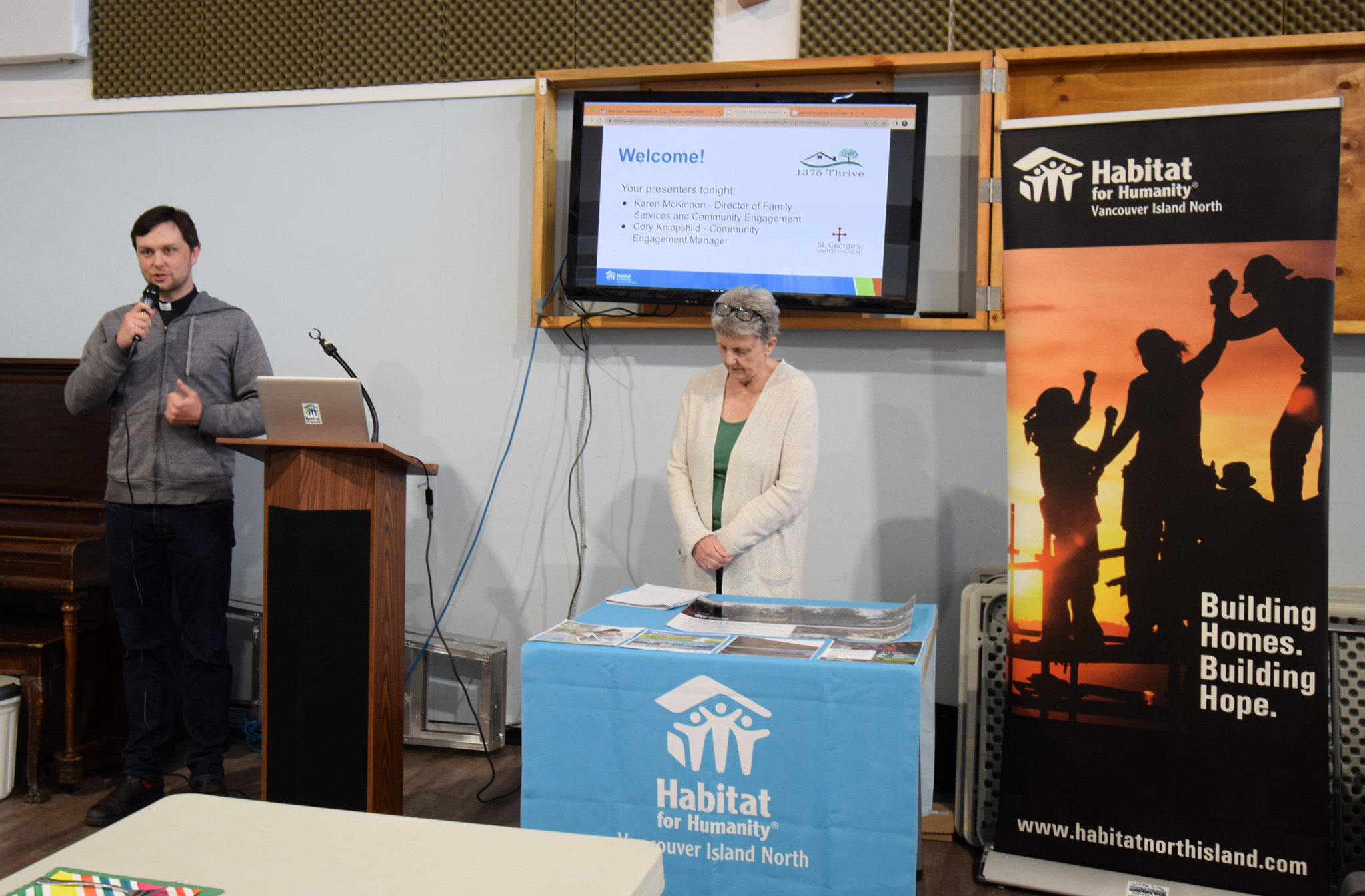 Reverend Ryan Slifka speaking at St.George's event for Habitat for Humanity.